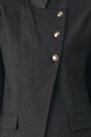 Woman wearing a black blazer military jacket with three buttons and faux pockets | FREEMARKET