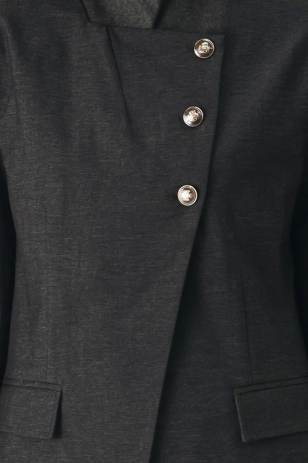 Woman wearing a black blazer military jacket with three buttons and faux pockets | FREEMARKET