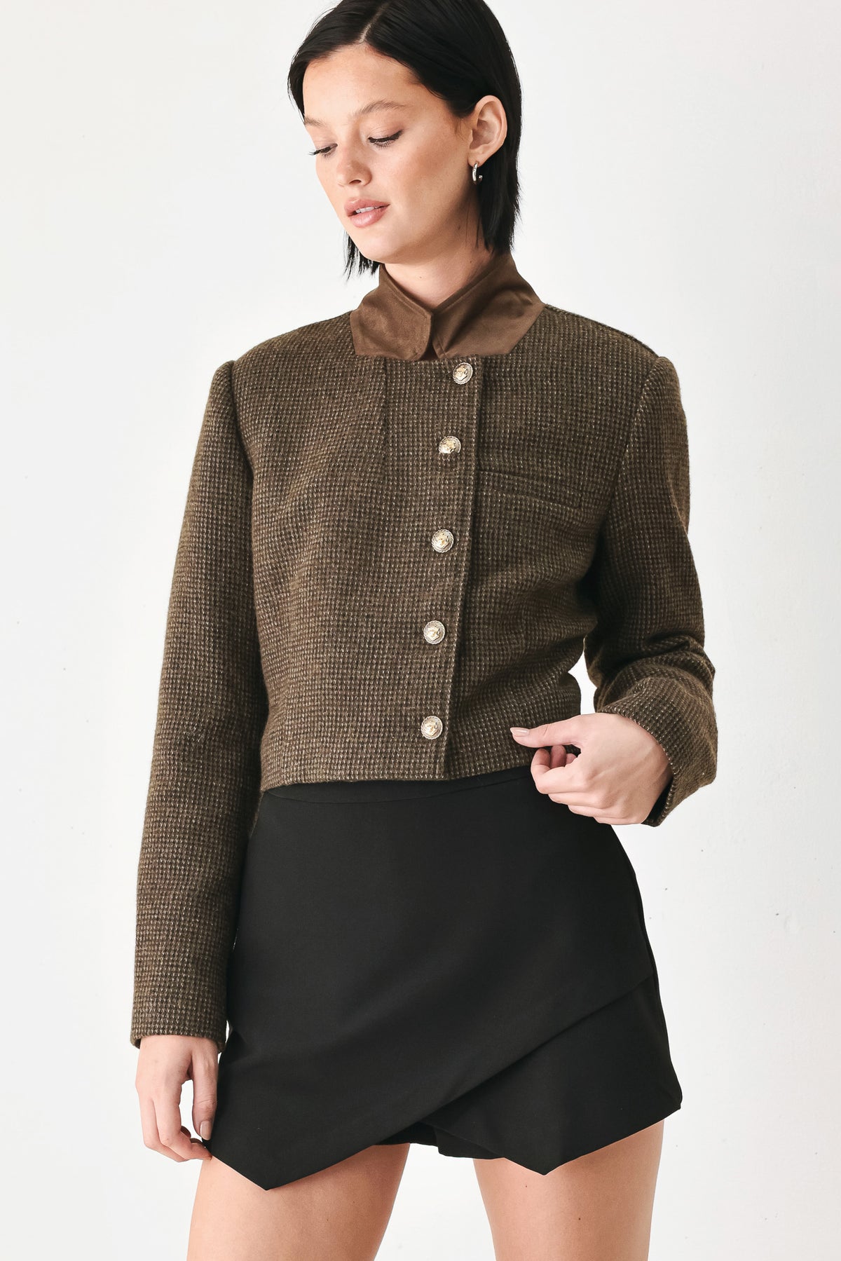 A model wearing a brown textured tweed jacket with a contrasting solid brown collar and decorative gold-tone buttons | FREEMARKET