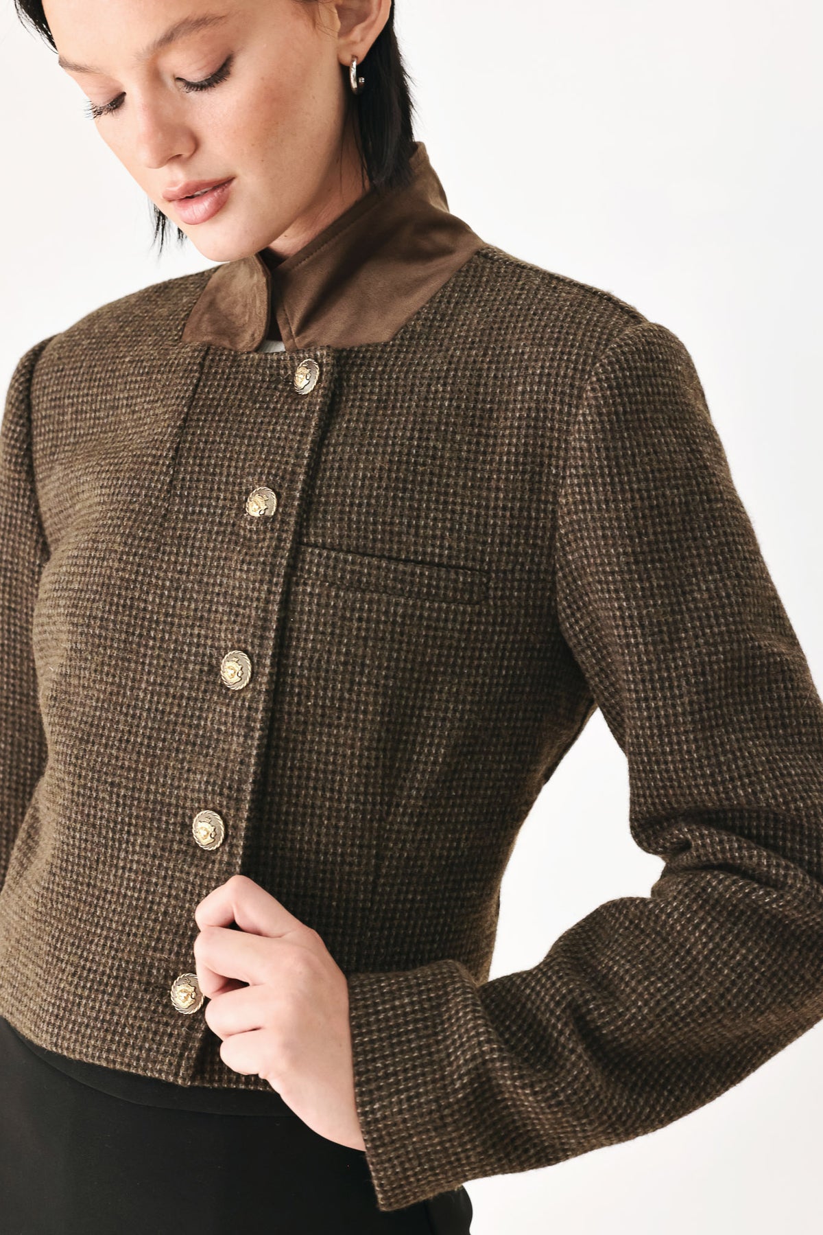 A model wearing a brown textured tweed jacket with a contrasting solid brown collar and decorative gold-tone buttons | FREEMARKET