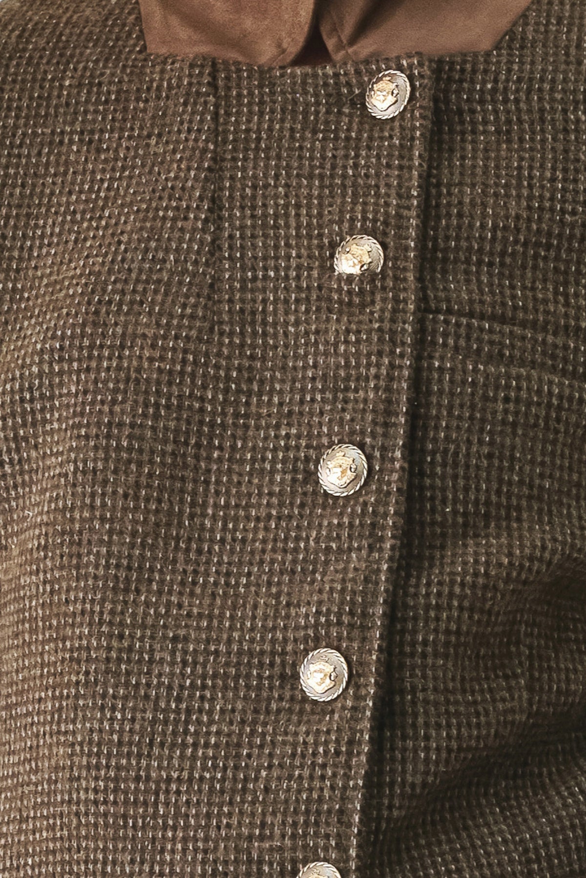 A model wearing a brown textured tweed jacket with a contrasting solid brown collar and decorative gold-tone buttons | FREEMARKET