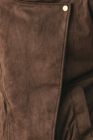 A woman wearing a dark brown suede jacket with a high collar and gold-tone snap buttons | FREEMARKET