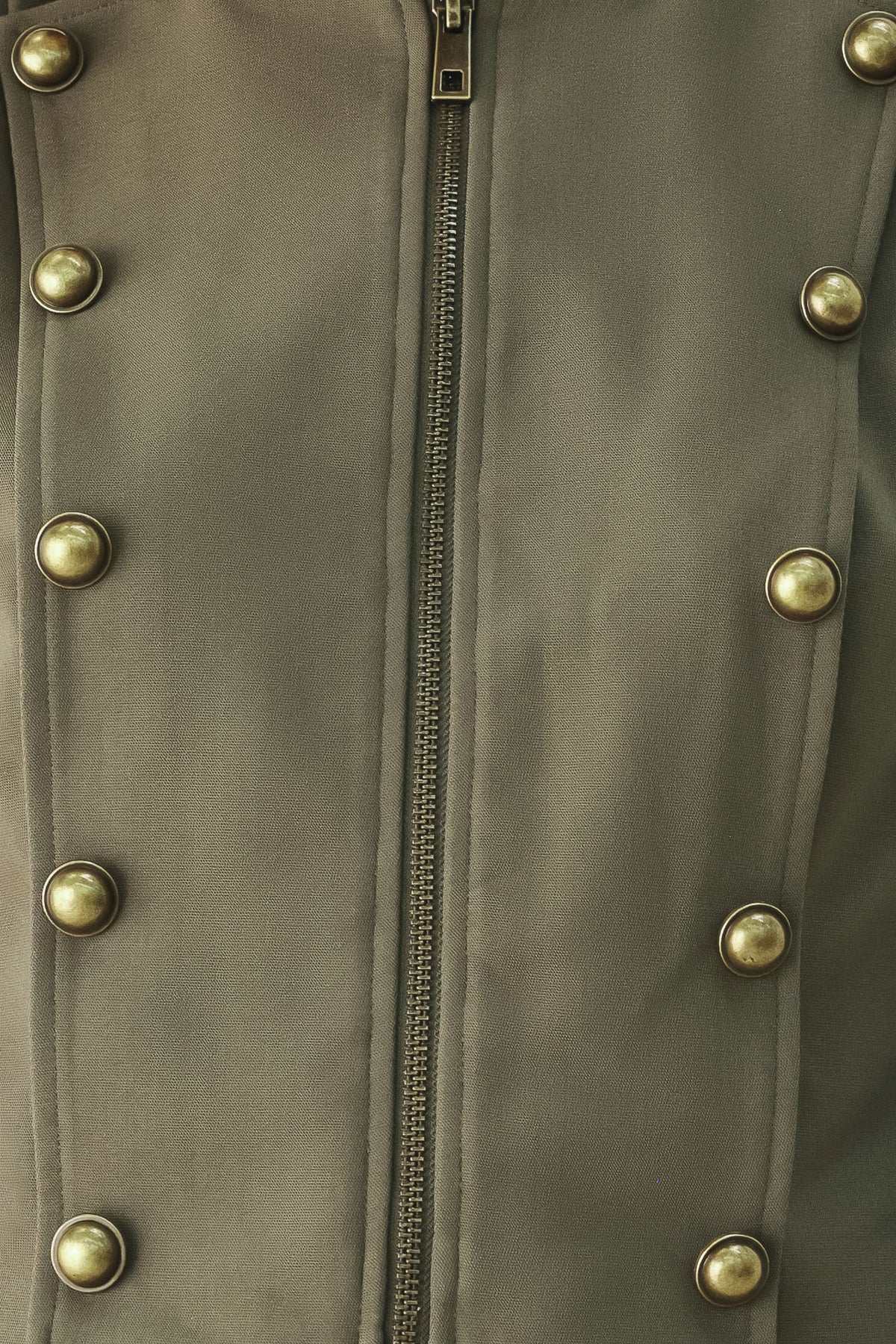 A model wearing an olive green military-style cropped jacket top with gold-tone double-breasted buttons, a front zipper, and a high mock neck | FREEMARKET