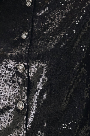 A woman modeling a black long-sleeve cropped jacket covered in sequins, featuring a buttoned front | FREEMARKET