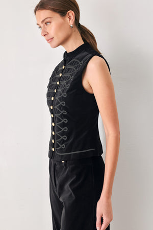 Model wearing a black velvet mandarin neck vest with military style stitching | FREEMARKET