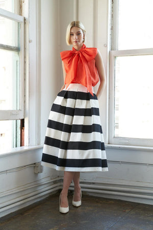 FREE AND EASY WOVEN MIDI SKIRT.