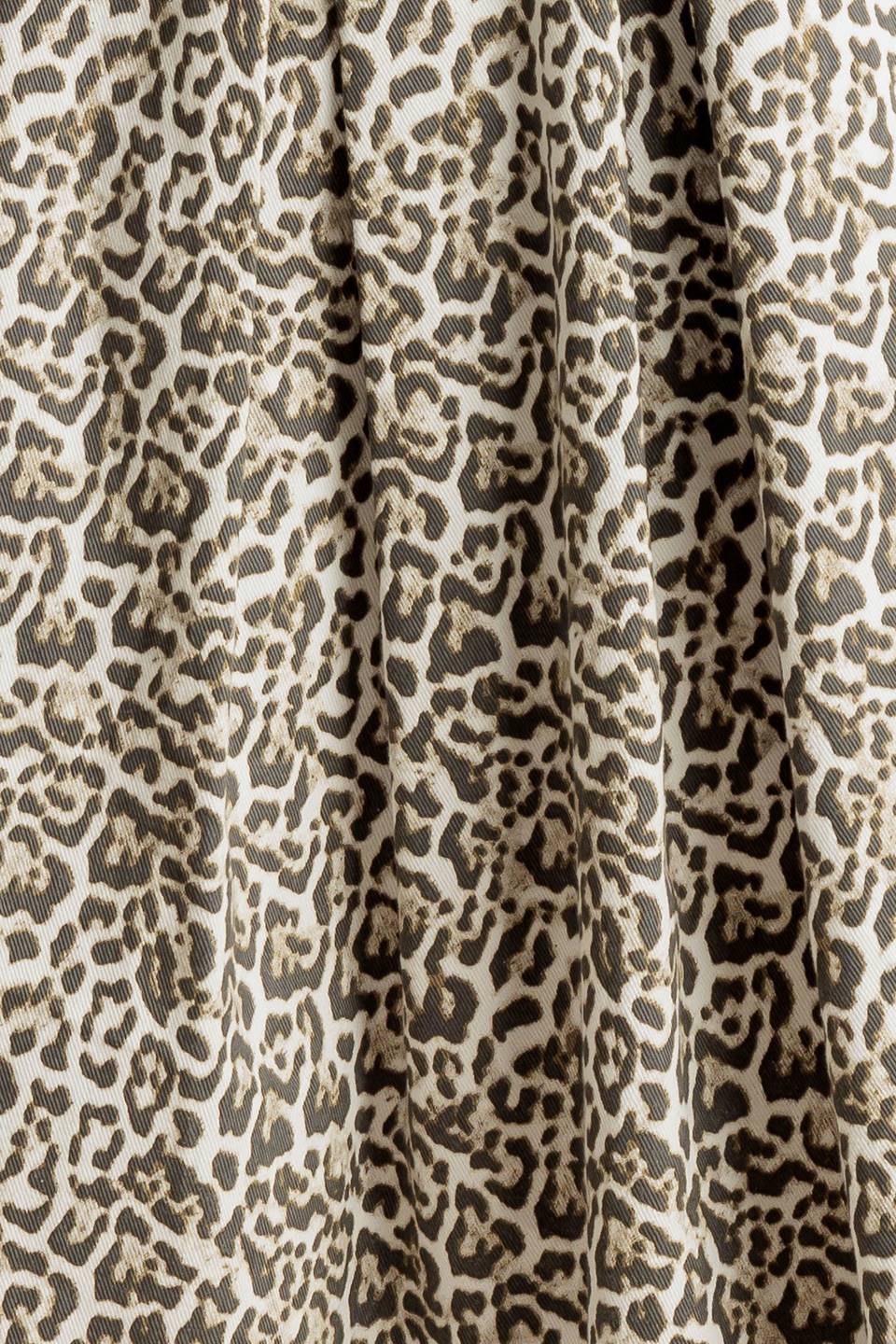 A leopard printed, woven midi full skirt a side zipper closure.