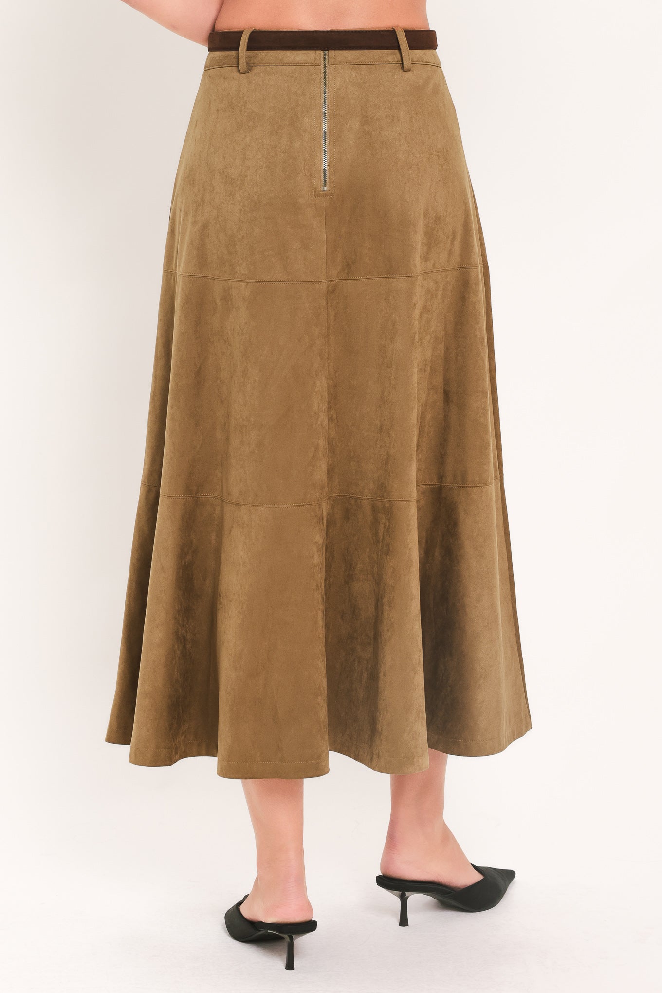A brown suede-like midi skirt with a front zipper, shown on a model from the waist down | Freemarket 