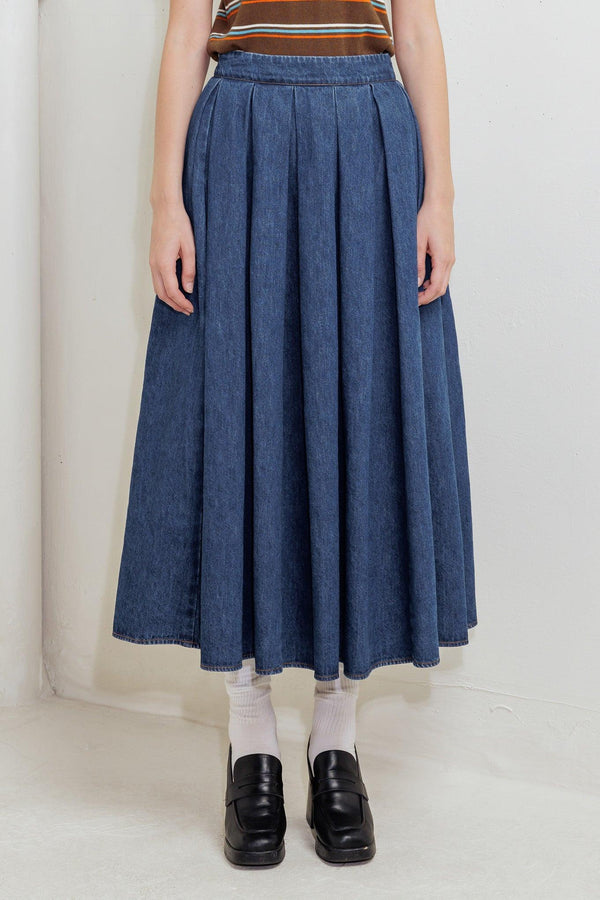 A washed denim full skirt with back zipper closure