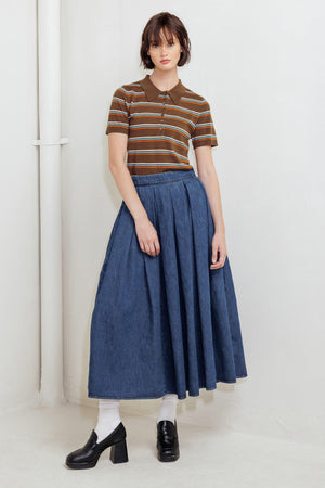 A washed denim full skirt with back zipper closure