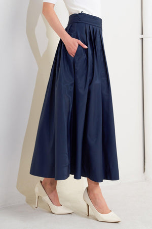 LUXE FLARE WOVEN PLEATED MIDI SKIRT.