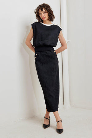 URBAN LUXE COMMAND KNIT MIDI SKIRT.