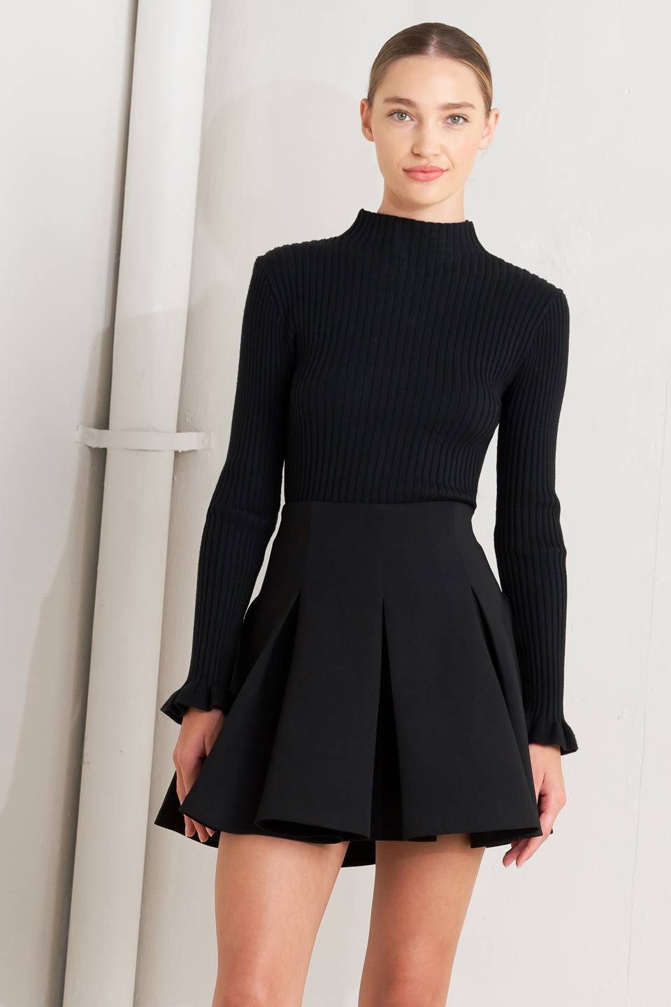 Woman wearing a black skirt | FREEMARKET