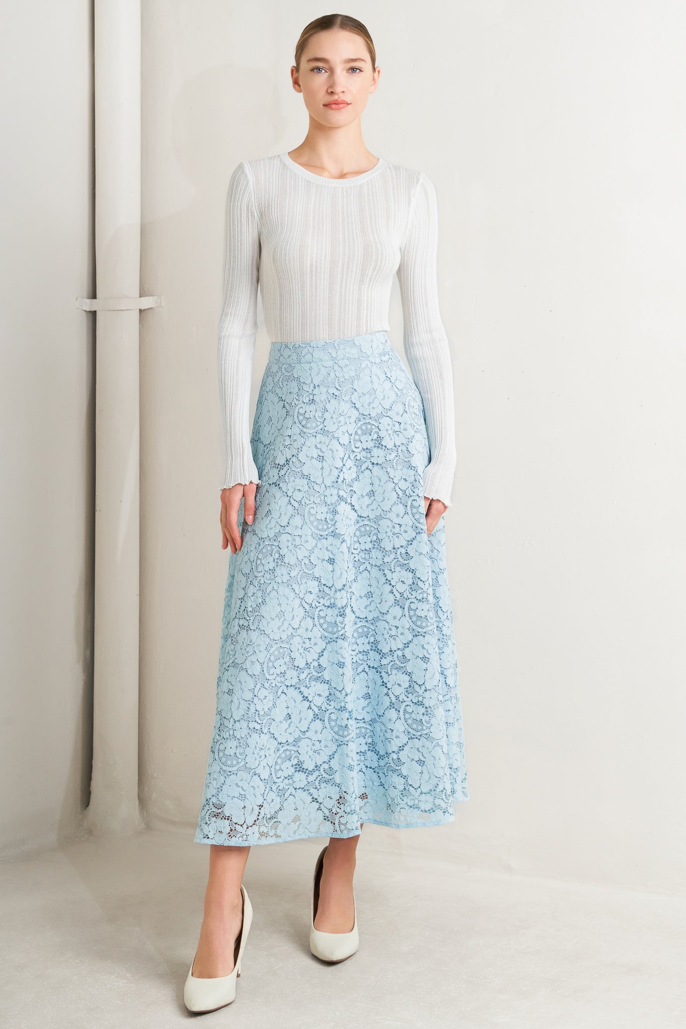 A woven lace circle midi skirt with back zipper closure

Details:

Self: 65% Cotton 35% Nylon&nbsp;

Lining: 100% Cotton

Size &amp; Fit

Model is 5`8" And Wearing Size Small&nbsp;
Measurements Taken From Size Small&nbsp;
Approx. Length: 37"