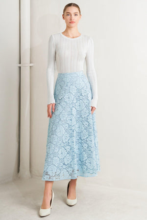 A woven lace circle midi skirt with back zipper closure

Details:

Self: 65% Cotton 35% Nylon&nbsp;

Lining: 100% Cotton

Size &amp; Fit

Model is 5`8" And Wearing Size Small&nbsp;
Measurements Taken From Size Small&nbsp;
Approx. Length: 37"