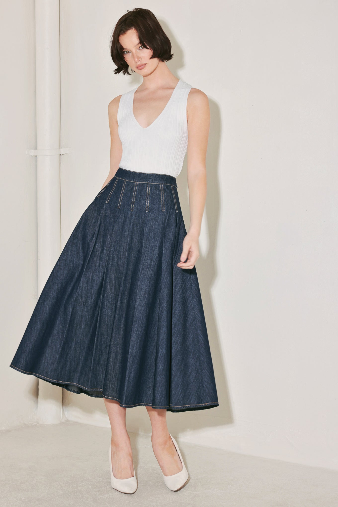 
A lightweight denim circle skirt with side zipper closure

Details:

Self : 100% Cotton

Size &amp; Fit

- Model is 5`8" And Wearing Size Small
- Measurements Taken From Size Small
- Approx. Length: 34"