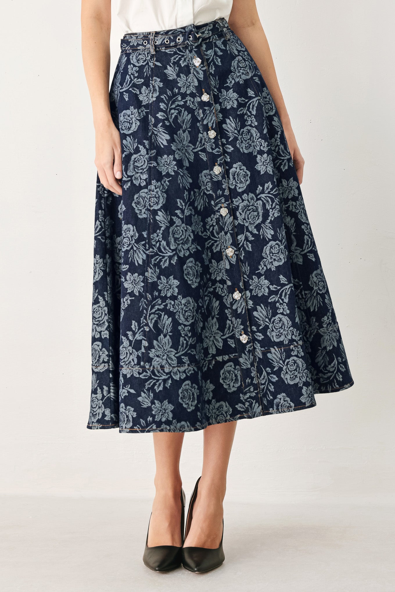 Woman wearing a denim woven jacquard full skirt with self belt and front button down | FREEMARKET