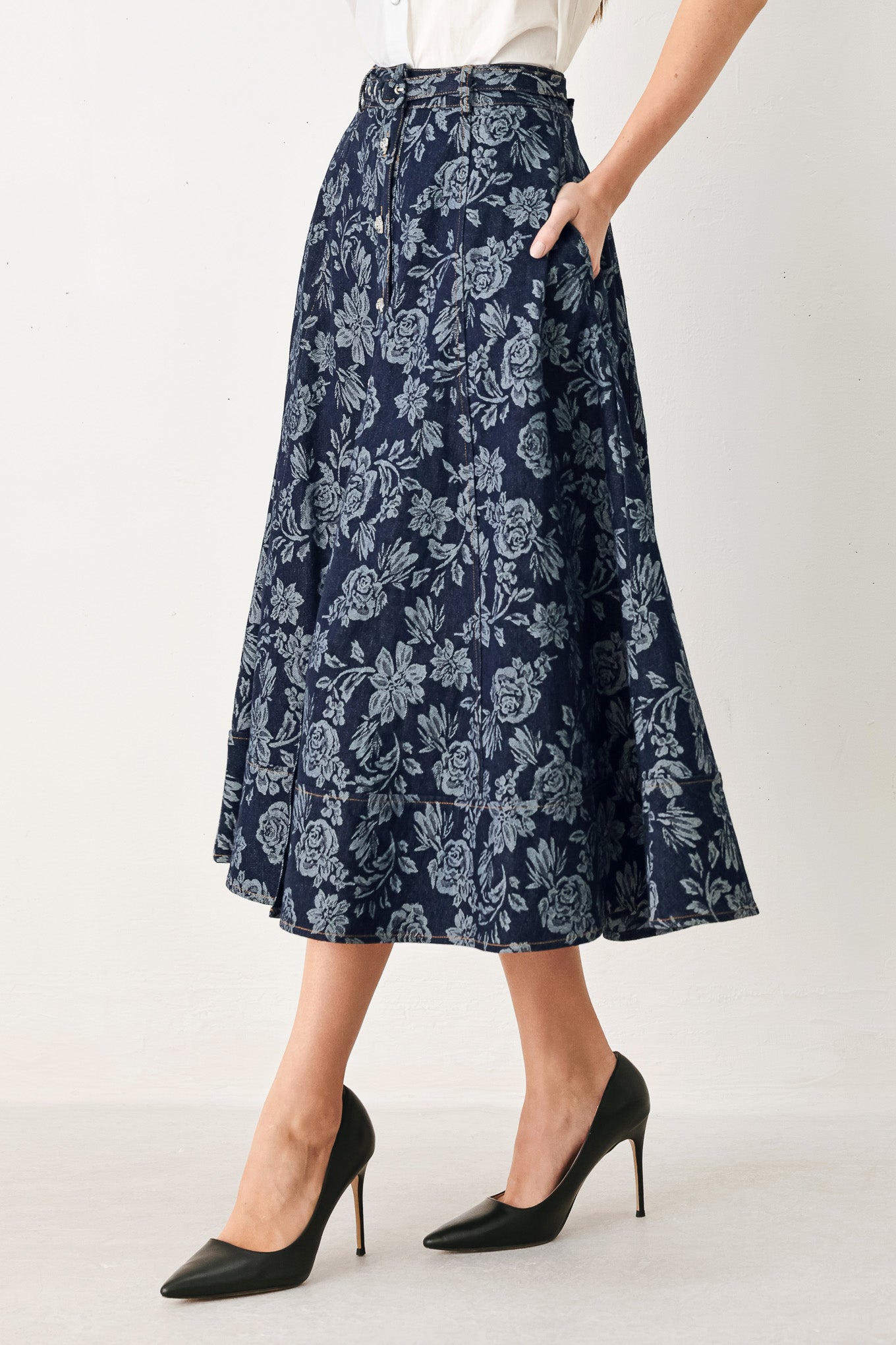 Woman wearing a denim woven jacquard full skirt with self belt and front button down | FREEMARKET