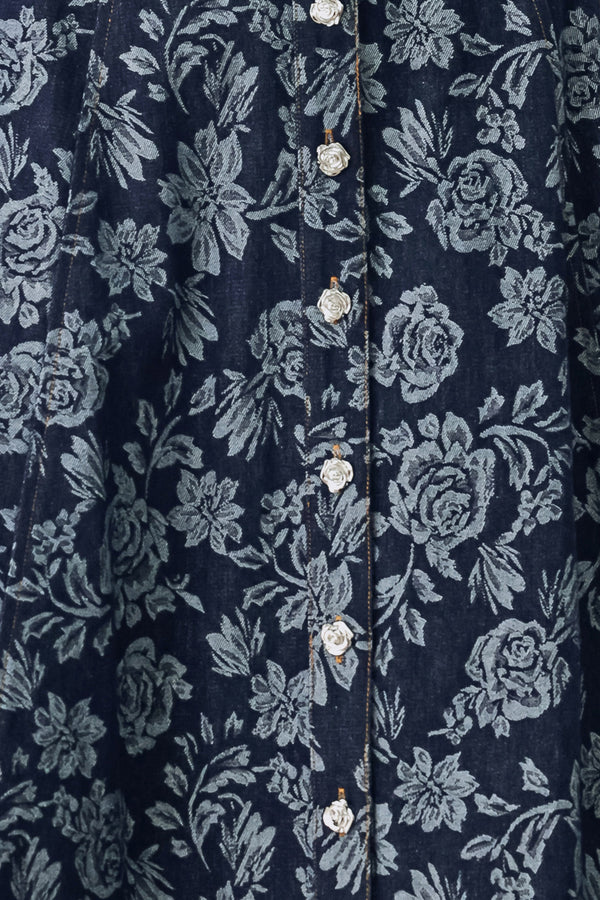 Woman wearing a denim woven jacquard full skirt with self belt and front button down | FREEMARKET