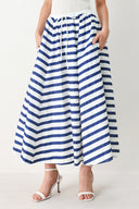 Woman wearing a blue and white striped printed woven full skirt with elastic waist and tie | FREEMARKET