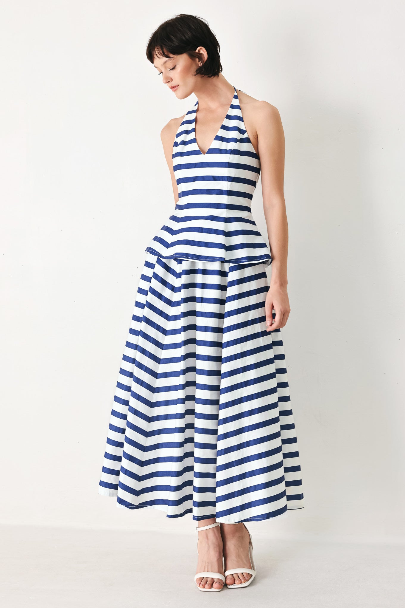 Woman wearing a blue and white striped printed woven full skirt and top set with elastic waist and tie | FREEMARKET