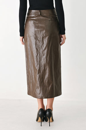 A model wearing a brown faux-leather midi skirt | FREEMARKET