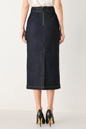 Woman wearing a dark blue denim mini pencil skirt with self belt, back slit and zipper closure | FREEMARKET