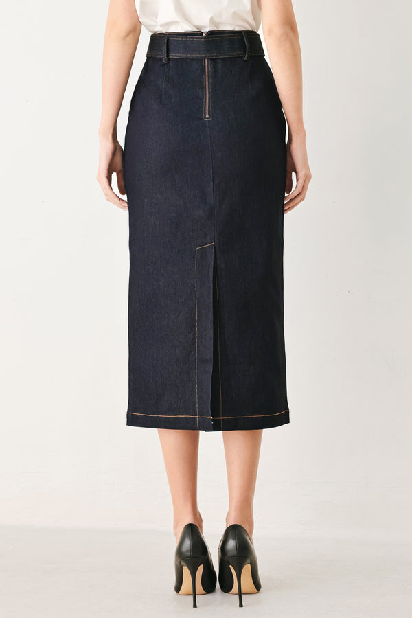 Woman wearing a dark blue denim mini pencil skirt with self belt, back slit and zipper closure | FREEMARKET