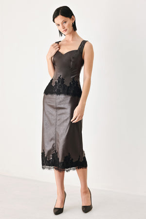 A brown faux-leather midi skirt with a black lace hem | FREEMARKET