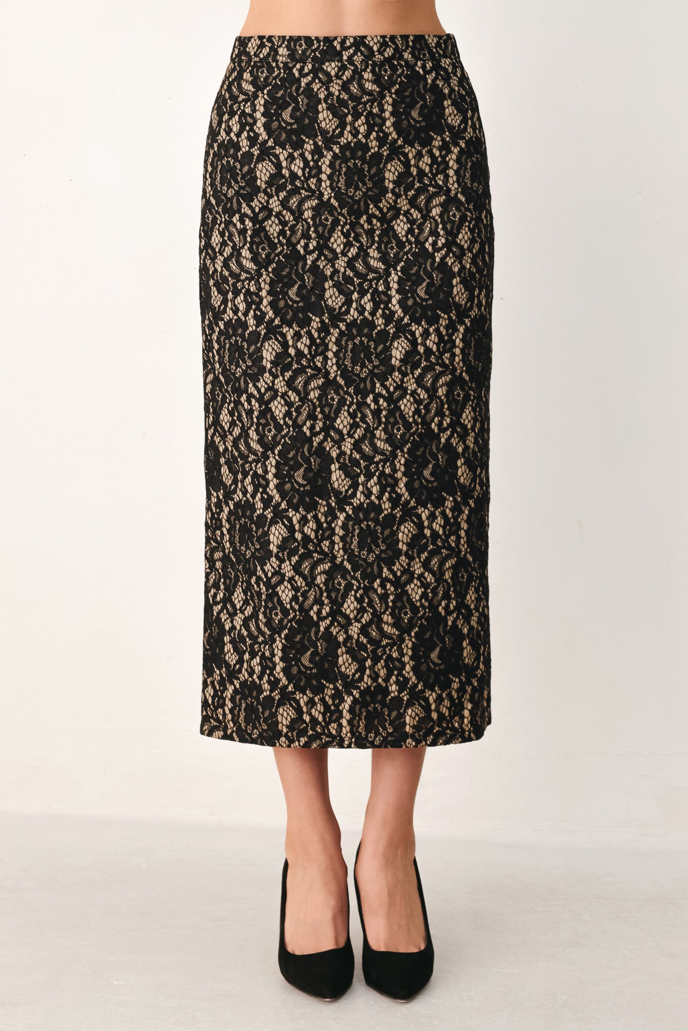A model wearing a black lace midi skirt | Flying Tomato