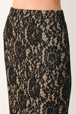 A model wearing a black lace midi skirt | Flying Tomato