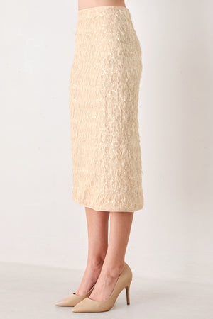 Woman wearing a high waisted midi skirt with sequins and fine faux fur/feathers | FREEMARKET