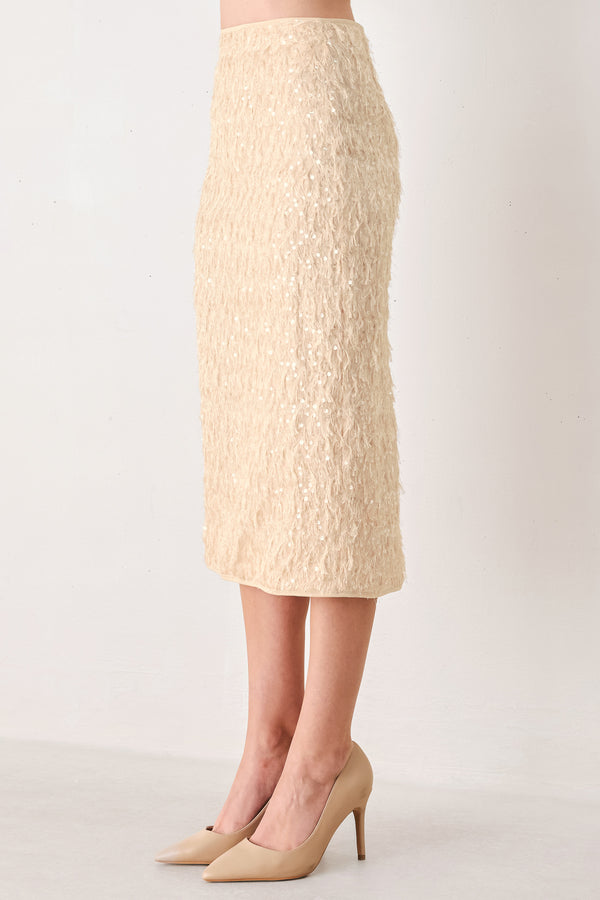 Woman wearing a high waisted midi skirt with sequins and fine faux fur/feathers | FREEMARKET