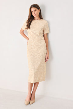 Woman wearing a high waisted midi skirt with sequins and fine faux fur/feathers | FREEMARKET
