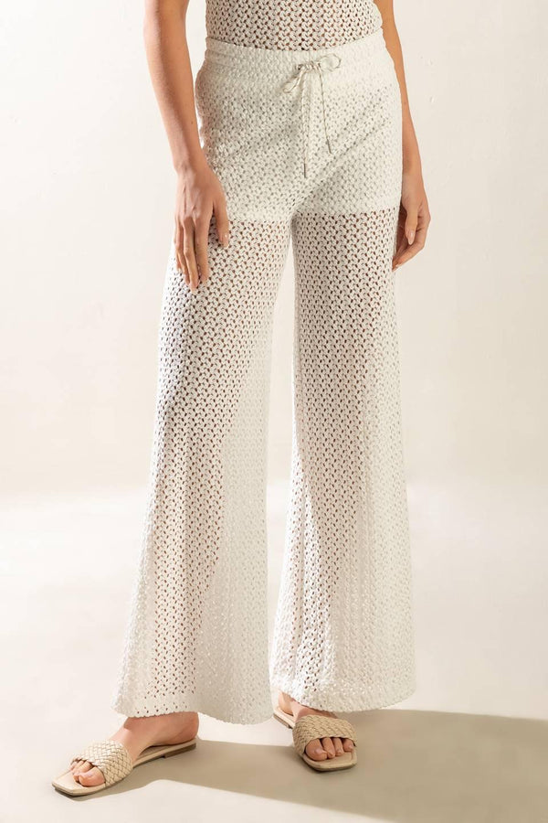 PRESENCE OF LOVE SEMI SHEER KNIT PANTS.