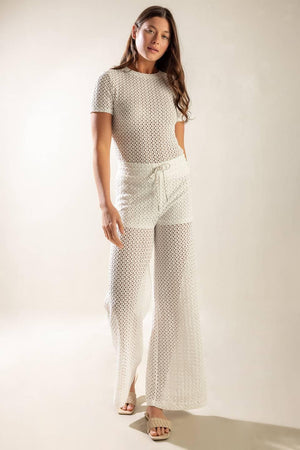 PRESENCE OF LOVE SEMI SHEER KNIT PANTS.