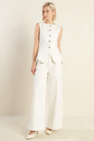 A solid woven pant featuring front closure, side pockets, and wide leg. Matching vest FJ1192

Details:

Self: 100% Cotton

Size &amp; Fit

- Model is 5`8" And Wearing Size Small
- Measurements Taken From Size Small
- Approx. Length: 44" Flying Tomato