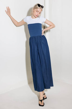 A chambray pant/jumpsuit 2fer with ribbed band and side pocket.