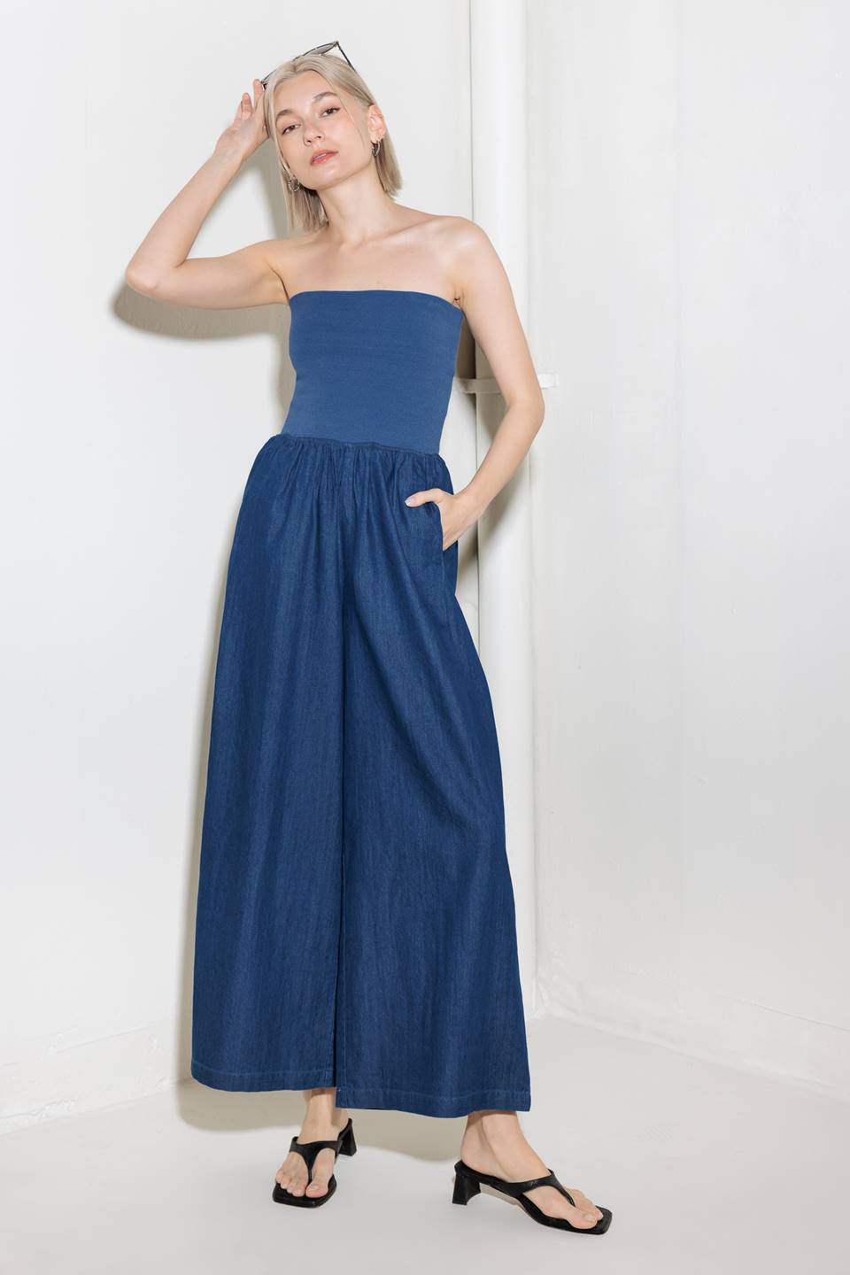 A chambray pant/jumpsuit 2fer with ribbed band and side pocket.
