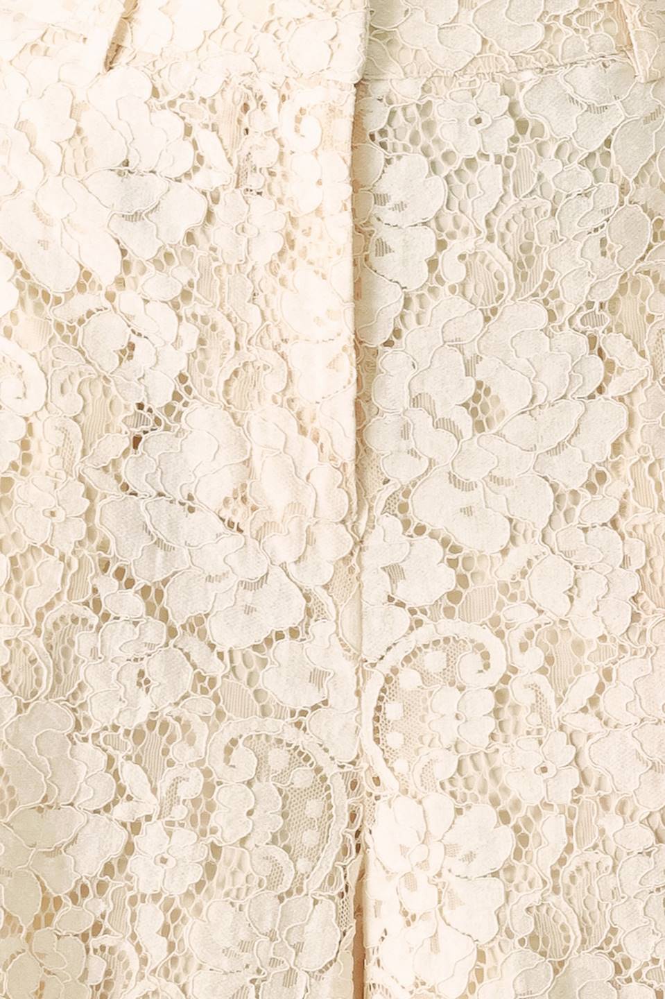 Close up of white lace pants with front closure and wide leg | FREEMARKET
