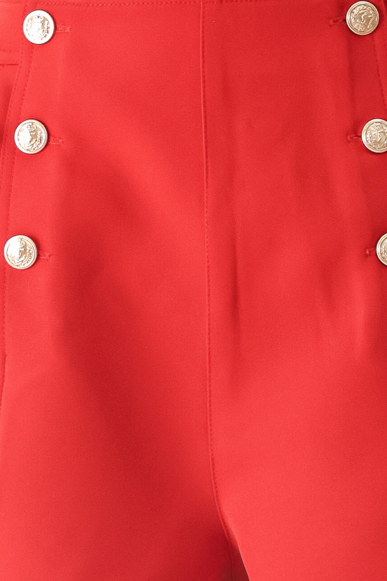 Close up of red shorts with buttons | FREEMARKET