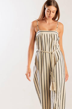 JUST THE BEGINNING WOVEN JUMPSUIT.