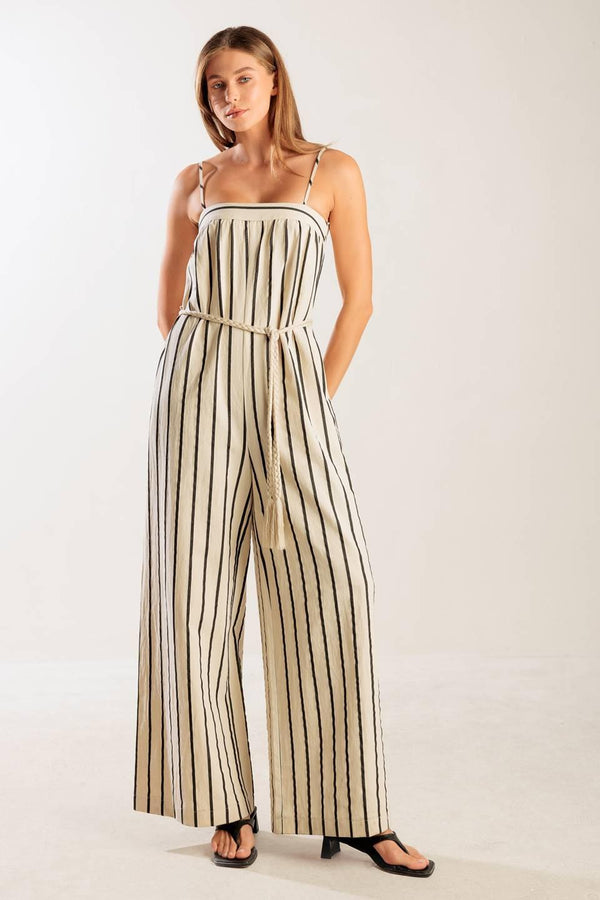 JUST THE BEGINNING WOVEN JUMPSUIT.
