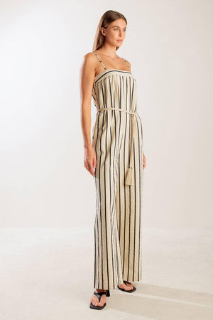 JUST THE BEGINNING WOVEN JUMPSUIT.