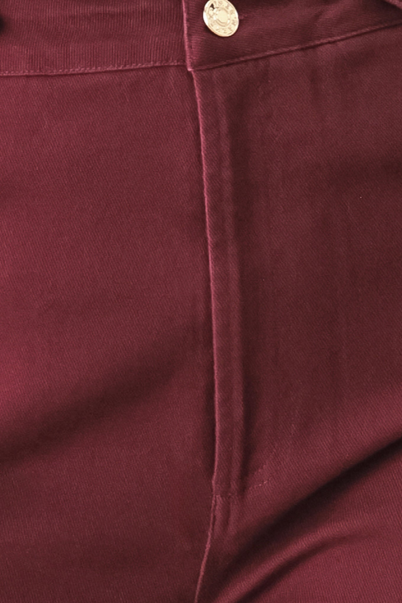 A woman wearing high-waisted burgundy wide-leg trouser pants with front closure and pockets | FREEMARKET