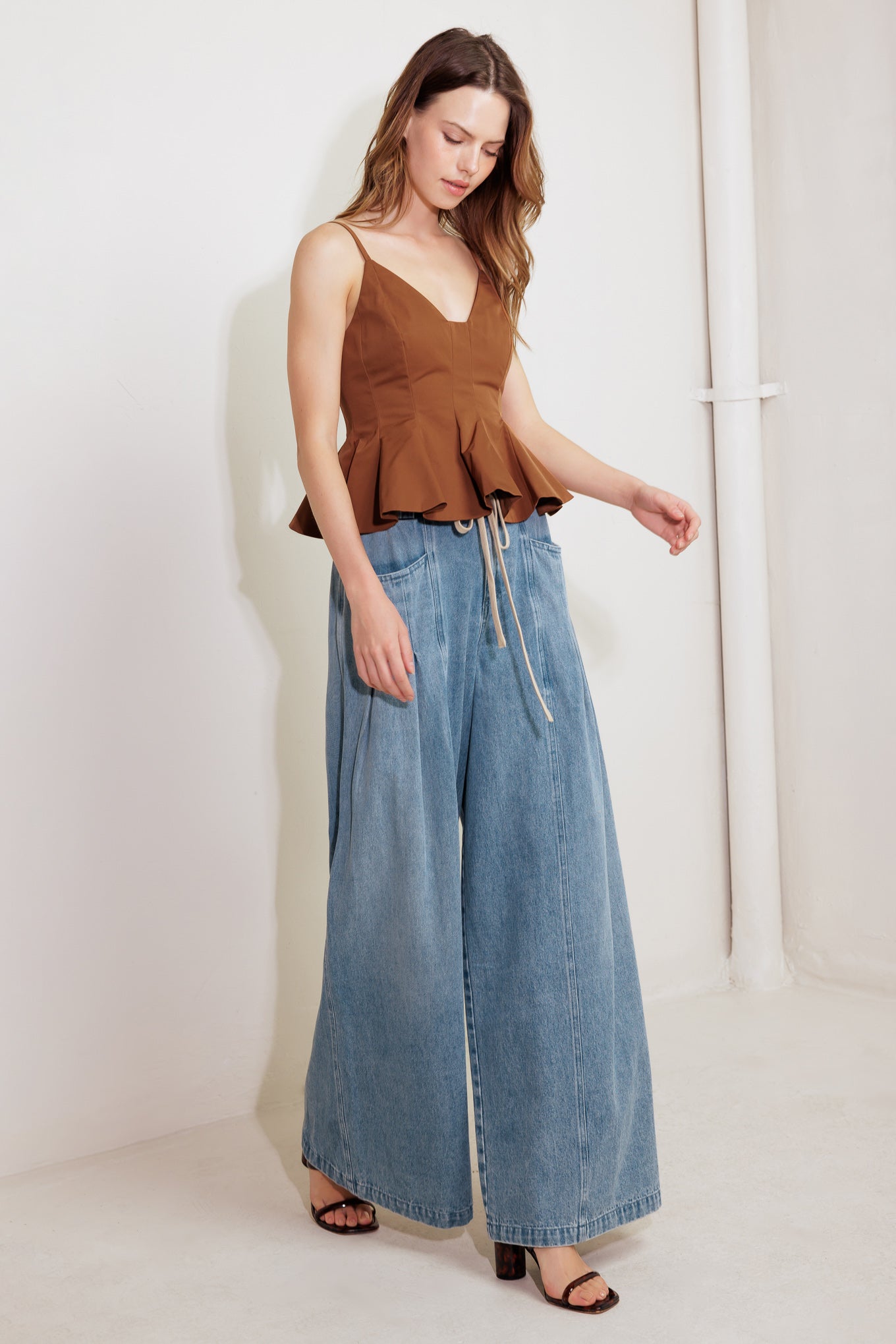 A washed denim pant featuring front closure, elasticized waist with contrasting tie, side pocket and wide leg

Details:

Self : 85% Cotton 15% Polyester

Size &amp; Fit

- Model is 5`8" And Wearing Size Small
- Measurements Taken From Size Small
- Approx. Length: 45" Flying Tomato