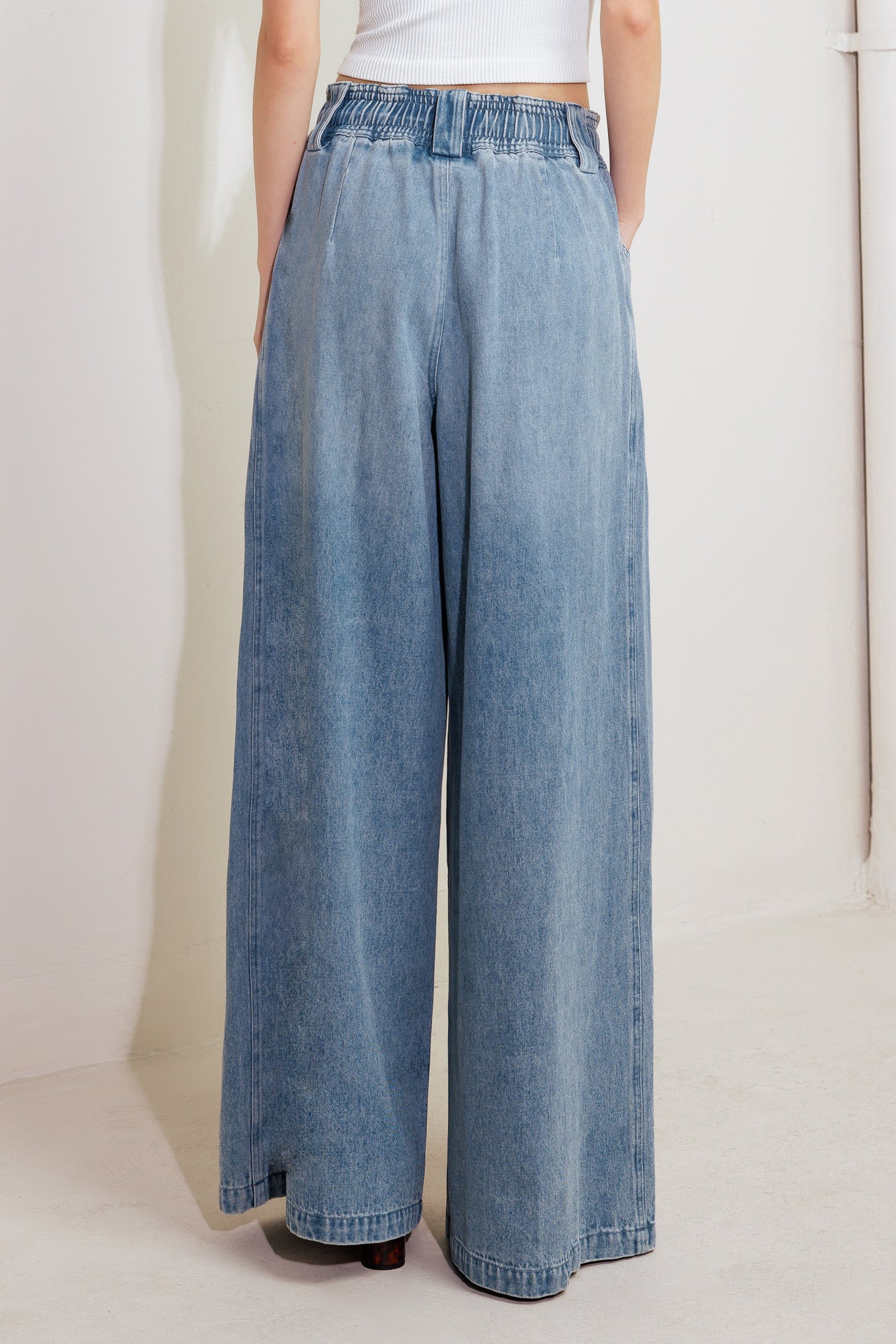 A washed denim pant featuring front closure, elasticized waist with contrasting tie, side pocket and wide leg

Details:

Self : 85% Cotton 15% Polyester

Size &amp; Fit

- Model is 5`8" And Wearing Size Small
- Measurements Taken From Size Small
- Approx. Length: 45" Flying Tomato
