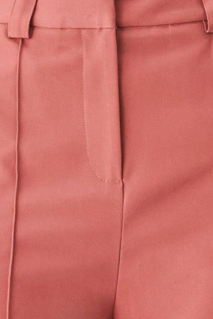 Woman wearing pink mauve woven wide-leg  trouser pants with front closure, side pockets | FREEMARKET