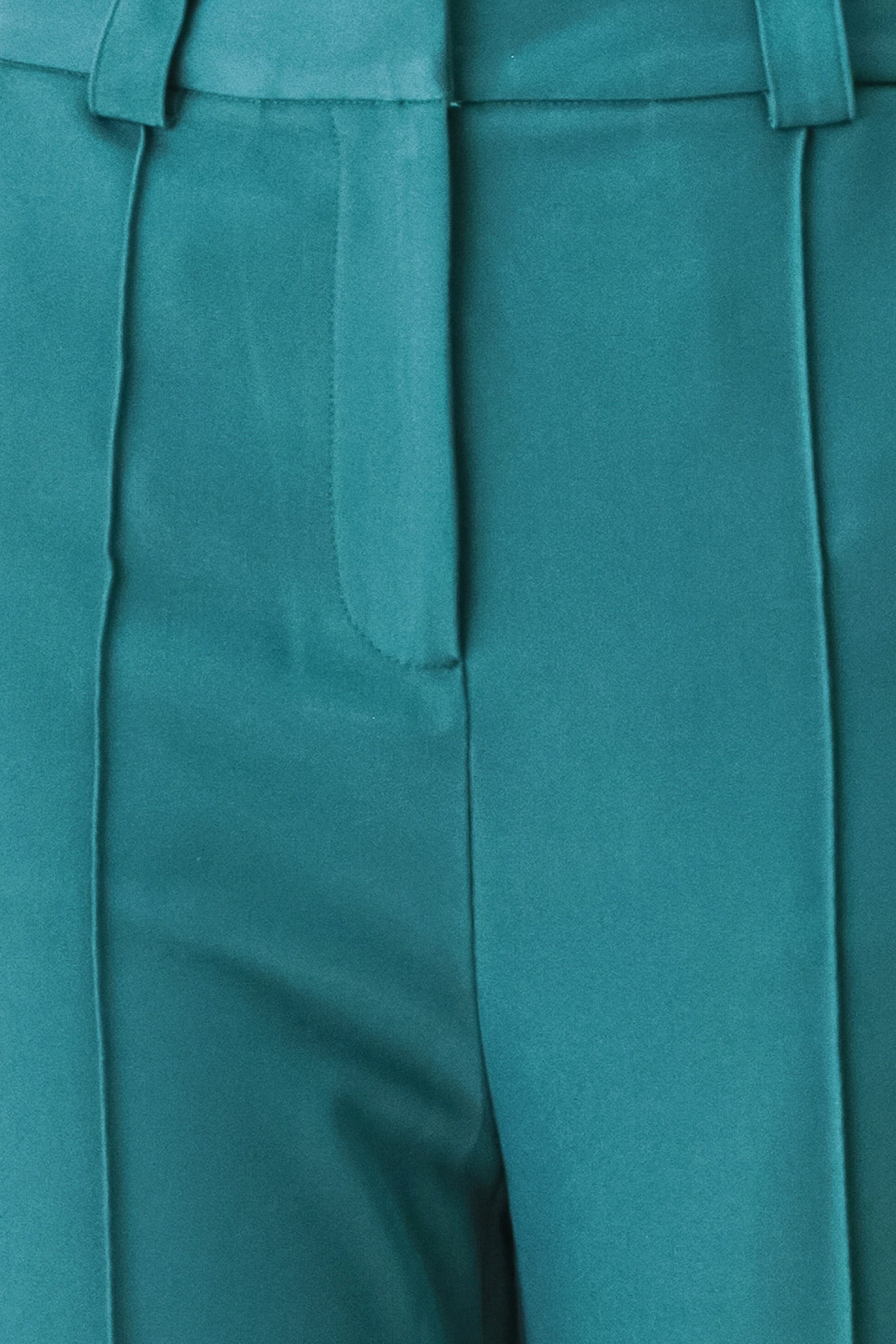 Woman wearing teal woven wide-leg  trouser pants with front closure, side pockets | FREEMARKET