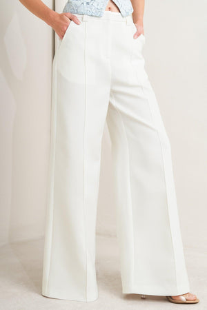 BRIGHT MOMENTS WOVEN PANTS.